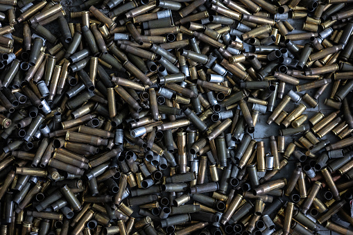 Closeup of a pile of .22 caliber long rifle hollow point bullets.Also in: