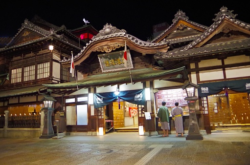 Matsuyama,Japan -April 29, 2014 : This is the main building of Dogo Onsen at night.Dogo Onsen is one of the oldest hot springs in Japan with a history of over 1000 years.\