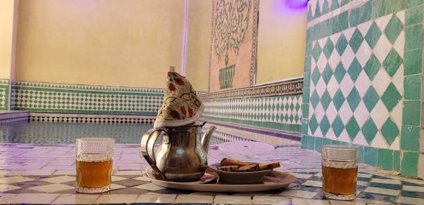 Moroccan tea The served at any time near the pool tea party horizontal nobody indoors stock pictures, royalty-free photos & images