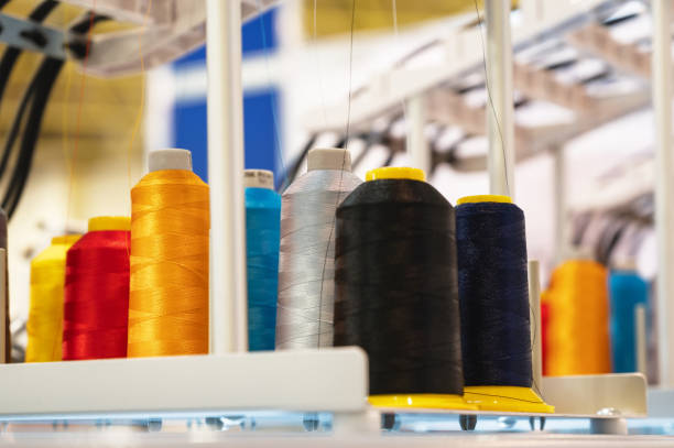 istock Set of coils with colorful threads on embroidery machine 1420486569