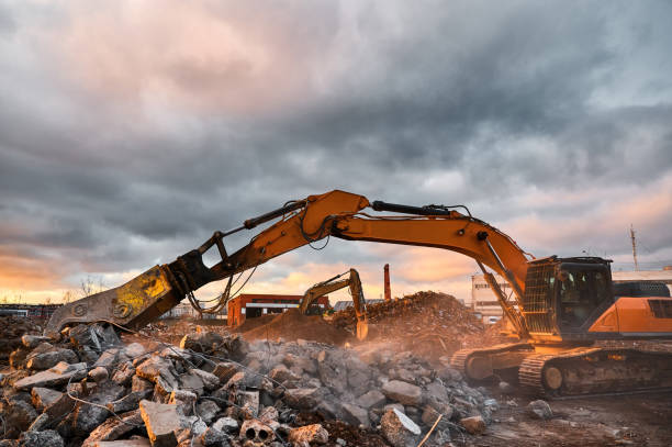 istock Modern crusher on excavator rigging dismantles concrete beam 1420486640