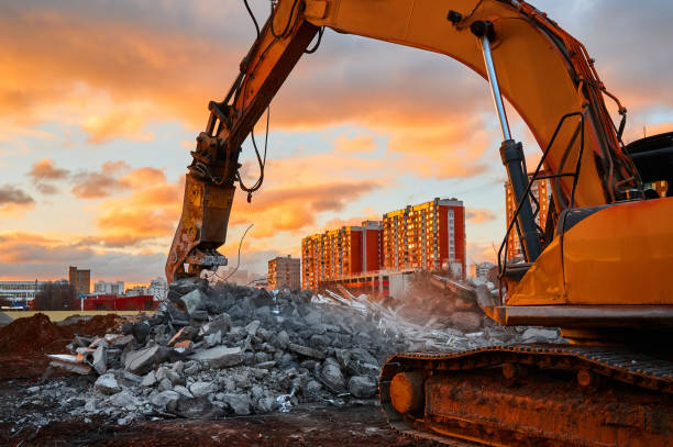 istock Excavator with concrete crusher on rig at demolition site 1420486651