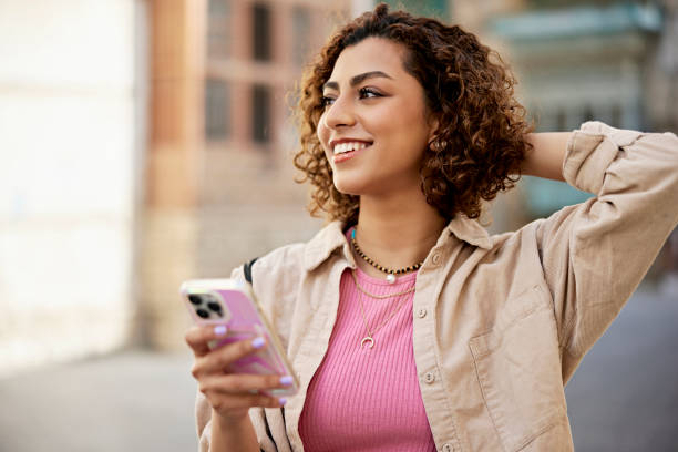 istock Candid headshot of Middle Eastern woman using smart phone 1420486861