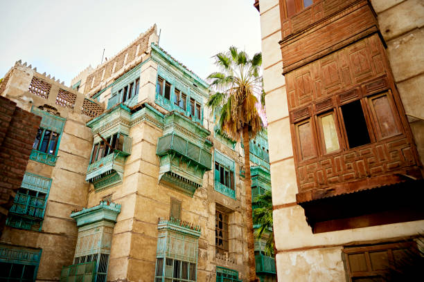 Historic vernacular architecture in Al-Balad, Jeddah Unoccupied tower houses 200-300 years old and part of Saudi Arabian culture with traditional mashrabiya balconies, currently under restoration. jeddah stock pictures, royalty-free photos & images