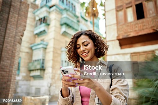 istock Candid portrait of young Middle Eastern digital native 1420486889