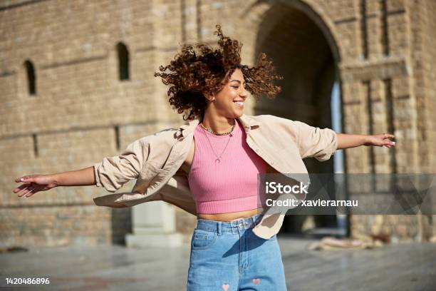 Carefree Young Woman Twirling At Baab Makkah Jeddah Stock Photo - Download Image Now