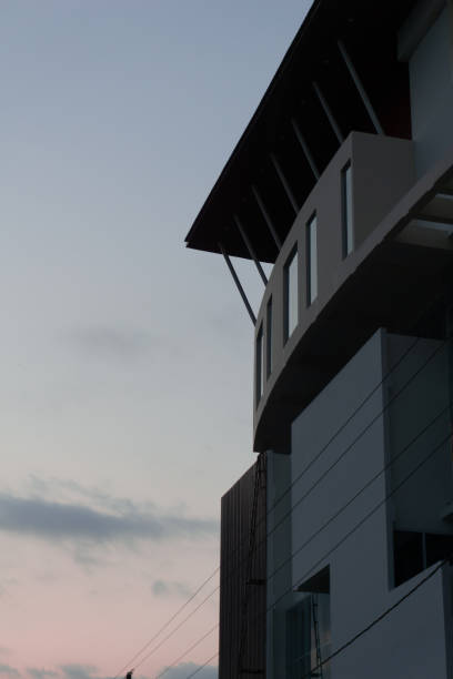 istock tall building with beautiful evening sky background 1420489970
