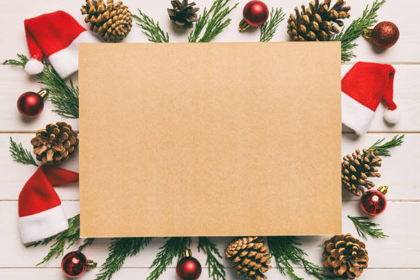 istock Flat lay Christmas composition. square Paper blank, pine tree branches, christmas decorations on Colored background. Top view, copy space for text 1420492038
