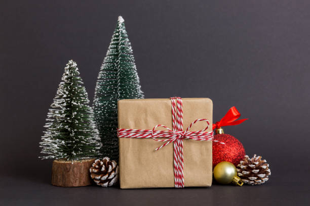 istock Christmas composition. Gifts, small tree, branches and craft DIY decorations on white background. New year concept. Christmas home decoration Flat lay, top view, copy space 1420492133