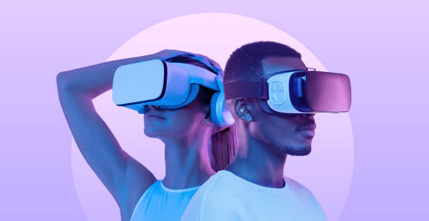 Metaverse people, banner of couple, man and woman in virtual reality headsets exploring VR world Metaverse people, banner of couple, man and woman wearing virtual reality headsets, exploring immersive VR world, playing ar online game together virtual reality stock pictures, royalty-free photos & images