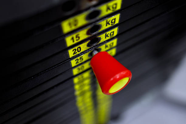 Weights in the gym. Gym weight machine. Amount of weight on lifting machine