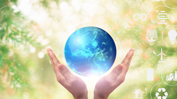 istock Industrial emissions pollute the environment and ecosystems. Including climate change, hands and the virtual world in green nature, Elements of this image furnished by NASA 1420501678