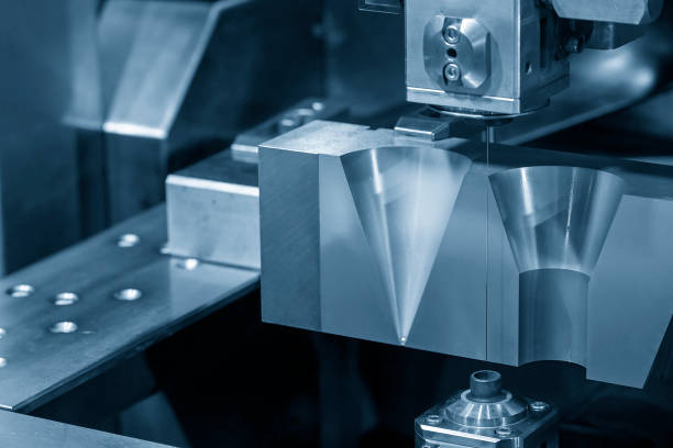 istock The wire EDM machine cutting the mold insert parts. 1420503630