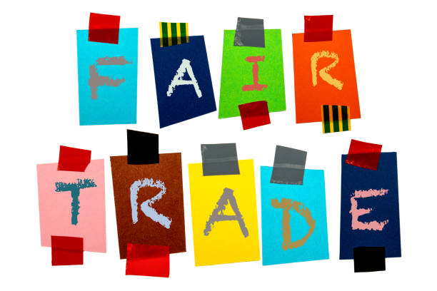 istock Fair Trade concept. Colored pages with text on a white background 1420504509