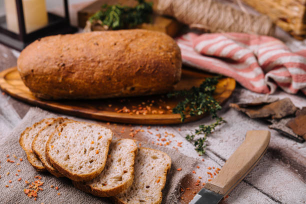 istock Sliced rye bread on a wooden table 1420513958