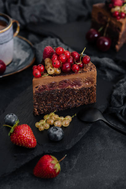 istock Delicious chocolate cake decorated with fresh berries 1420514122