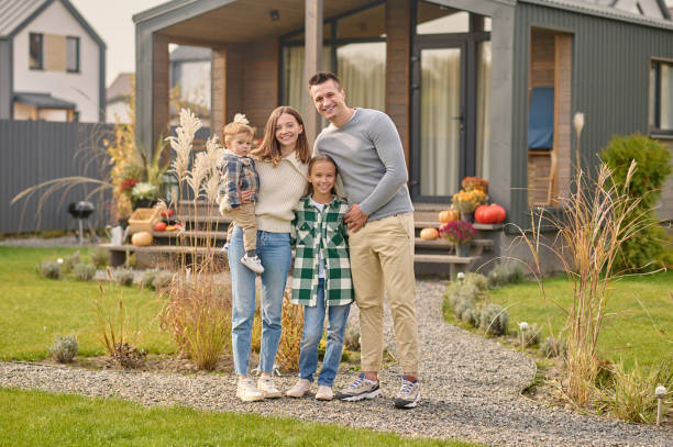 Parents and their kids in the backyard