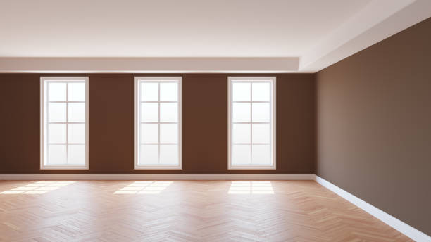 istock Beautiful Empty Interior of the Brown Room with a White Ceiling and Cornice 1420521213
