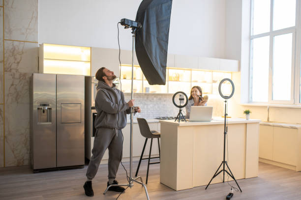 istock Team of professionals preparing for shooting a video blog 1420523049