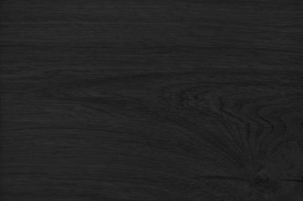 istock abstract dark black oak wooden marble structure use as background. close up wood texture with blank space for design. elegant wooden texture (focused at center of image). 1420523600