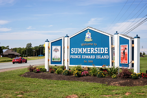 Summerside, Canada - August 22, 2022. A vehicle passes the welcome sign at the city of Summerside, Prince Edward Island.