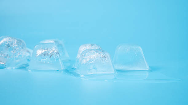 istock ice cubes closeup on blue background 1420544186