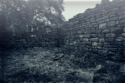 The ruins of old house in black and white