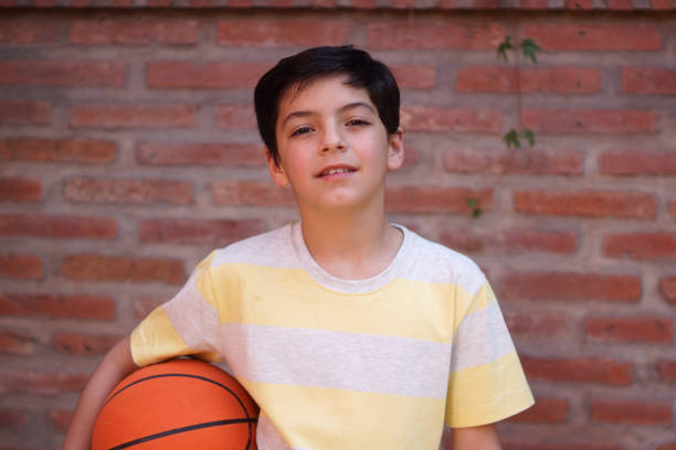 istock portrait of boy whit ball 1420563702