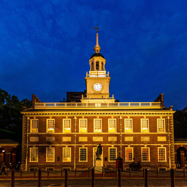 Independence Hall in Philadelphia The Independence Hall in Philadelphia, Pennsylvania, during the morning blue hour historic building stock pictures, royalty-free photos & images