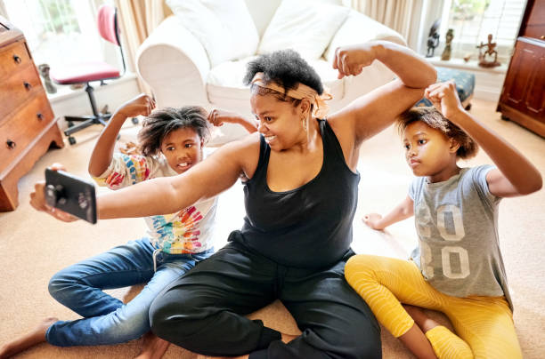 istock Mother with her kids taking a selfie after exercise at home 1420571204