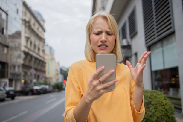 istock Happy woman using phone 1420577557