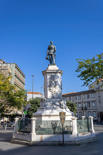 Porto, Portugal - July 6, 2022: A bronze statue of King D. Pedro V (circa 1924) by Antonio Teixeira Lopes (1866-1942) on Praça da Batalha.
