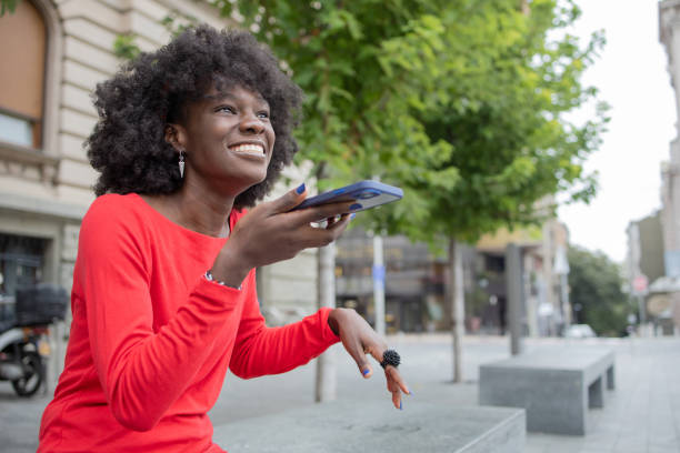 istock Happy woman using phone 1420595171