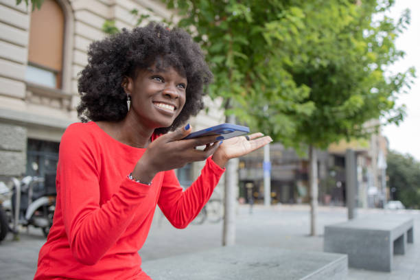 istock Happy young woman using phone 1420595172