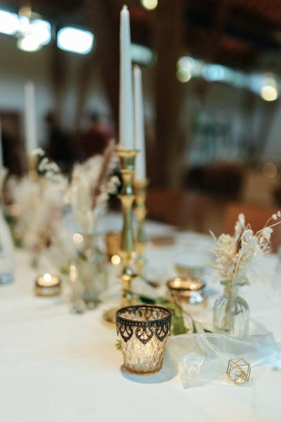 istock Elegant table setting and decoration for a dinner at a wedding location 1420595679