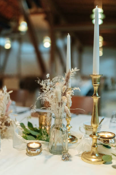 istock Elegant table setting and decoration for a dinner at a wedding location 1420596208