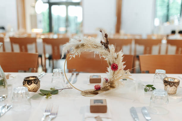 istock Elegant table setting and decoration for a dinner at a wedding location 1420596209