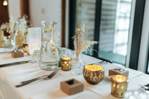istock Elegant table setting and decoration for a dinner at a wedding location 1420596210
