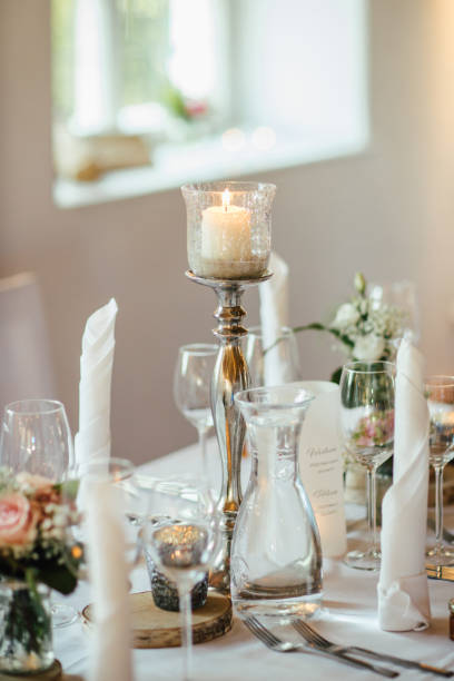 istock Elegant table setting and decoration for a dinner at a wedding location 1420600177