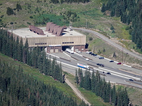 Eisenhower Tunnel, Colorado, USA-August 29, 2022:View high above Interstate 70 as it enters the Eisenhower Tunnel under the Continental Divide, Colorado.
