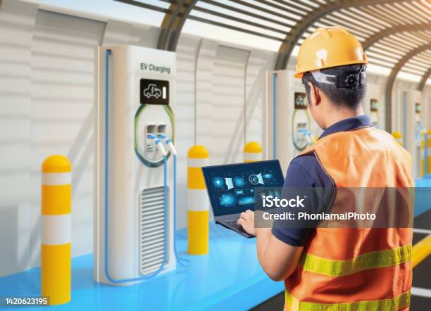 Engineer Or Technician With Ev Charging Stations Stock Photo - Download Image Now - Electric Vehicle, High Angle View, Electric Vehicle Charging Station