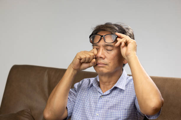 istock Senior asian man has eyestrain and fatigue 1420633242