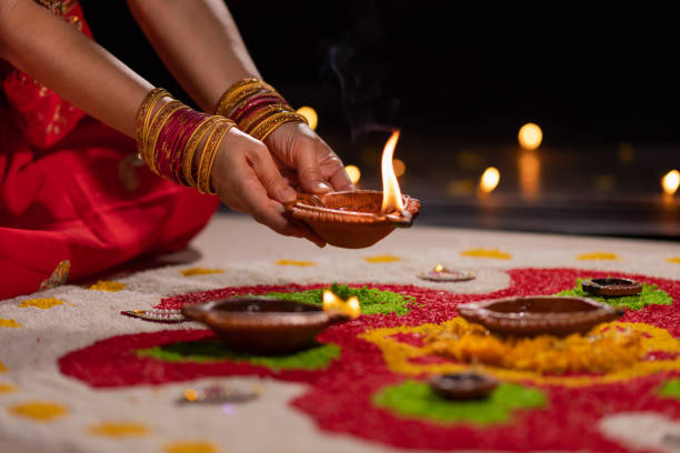 istock Traditional diya lamps lit during diwali celebration 1420633310