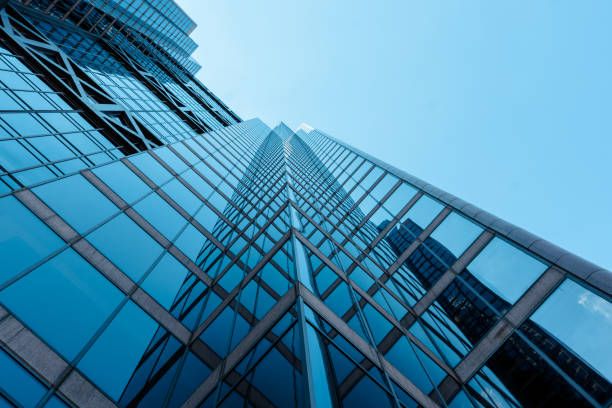 istock Look-up shot of a modern skyscraper. 1420637388