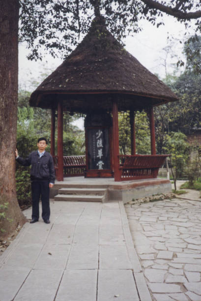 istock 1990s Chinese Men Real Life old photo 1420641566