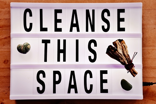 Words 'Cleanse This Space' in a Light Box Trend for a Modern Positive White Witch/ Wicca Theme.
