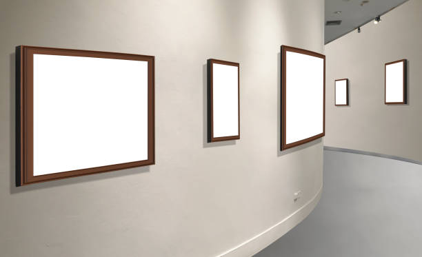 istock Blank picture frames with clipping path on white wall in curved corridor area inside of art gallery 1420647751