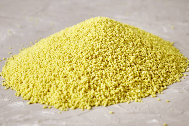 istock yellow croup couscous heaped on the table 1420660658
