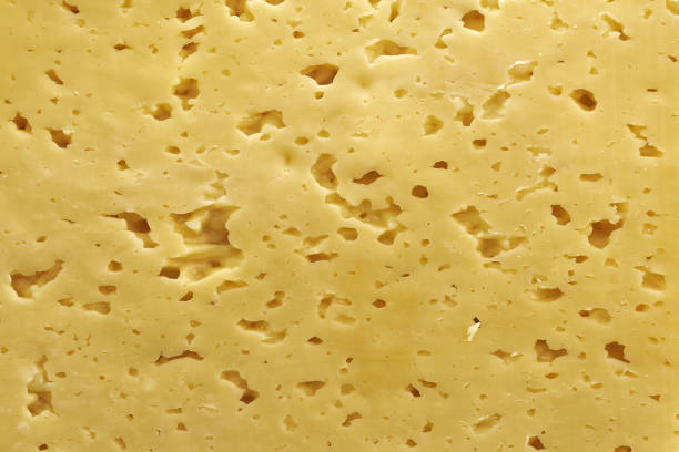 istock cut of fresh milk cheese close-up background backdrop 1420660739