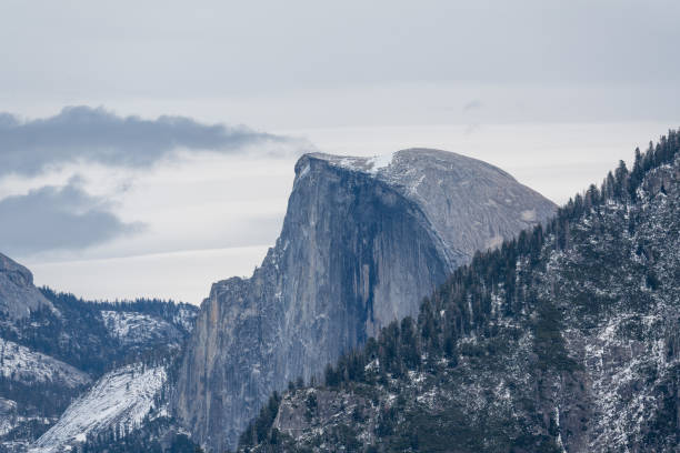 Tunnel view outlook in Yosemite National Park, California, USA, seen a day in the spring. In the middle of the image the iconic Half Dome mountain peak.